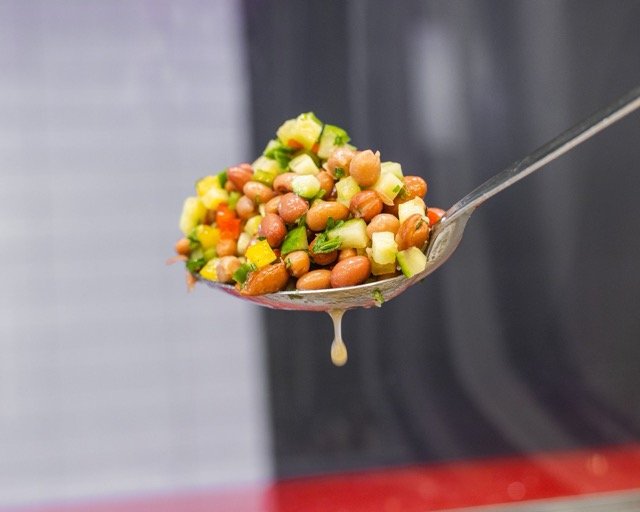 Amir food photography showing a small side dish.